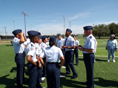 Cadets being instructed by superiors