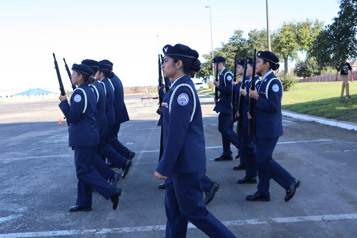 drill team marching in line uniform motion